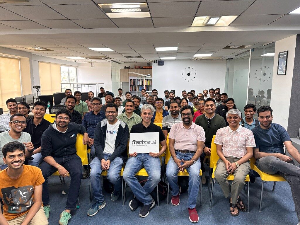 mitramandal.ai Episode 2 group photo - attendees with मित्रमंडळ.ai sign, Feb 21, 2026