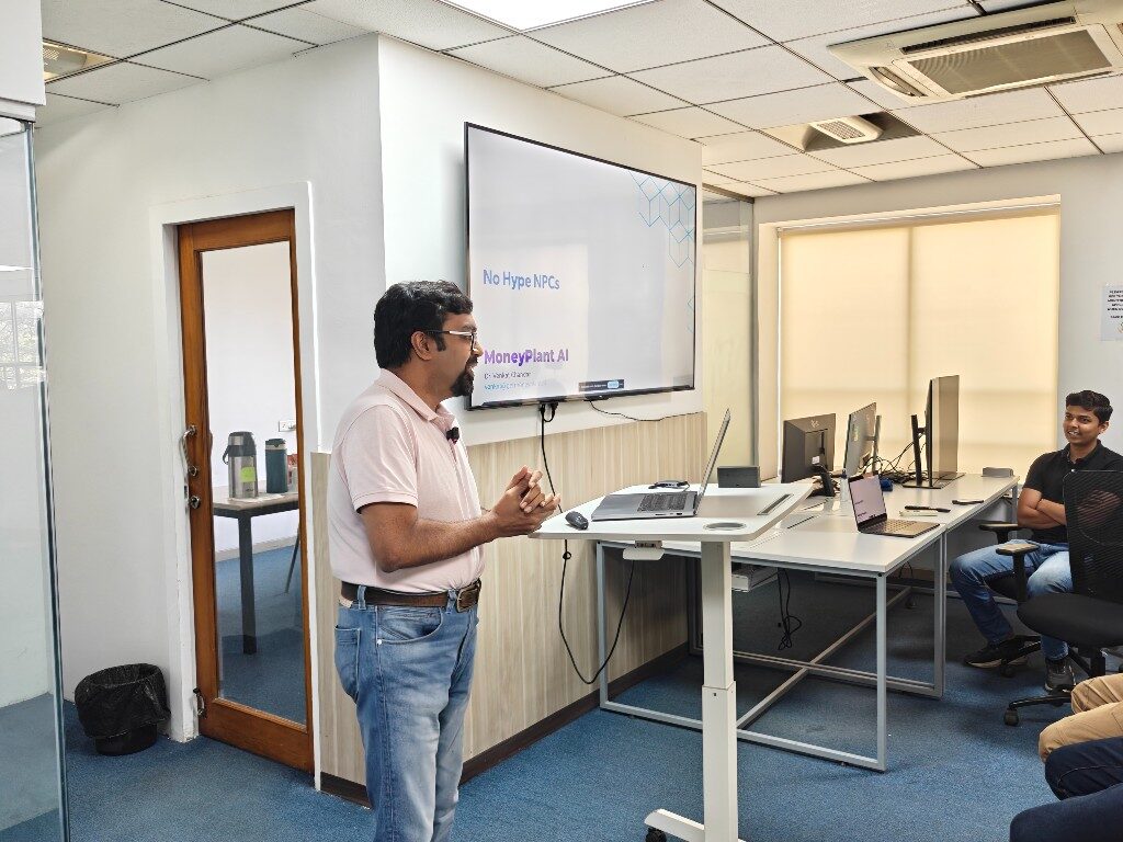 Dr. Venkat Chandar presenting MoneyPlant.AI - Shipping AI Without Breaking Your Game